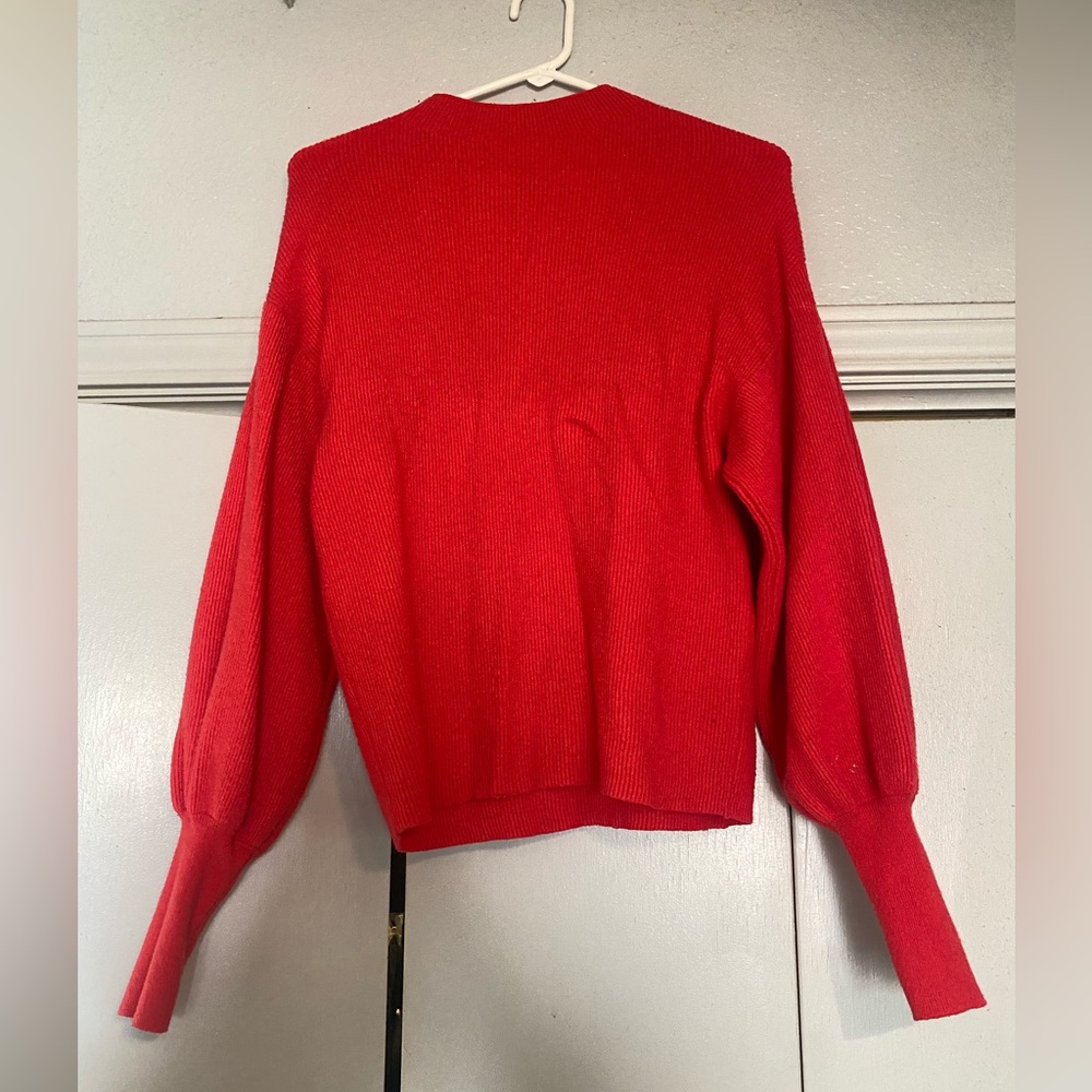 Neon red sweater